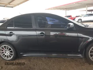 2013 Mitsubishi Lancer Evolution GSR with VIN JA32W8FV6DU009257, listed as a IAAI auction lot 41917942 with 125,279 mi miles. Bid and sale history available at carsss.com. Image 13.