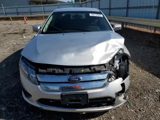 2012 Ford Fusion SE z VIN 3FAHP0HA8CR432289, wystawiony jako Copart lot #58714925 z przebiegiem 59 201 mil mil oraz Szkoda całkowita • Salvage title. Historia ofert i sprzedaży dostępna na DreamBid. Obrazek 5.