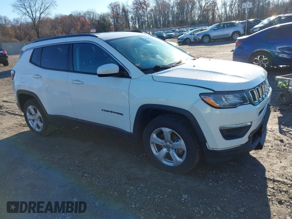 2020 Jeep Compass Latitude with VIN 3C4NJDBB2LT115599, listed as a IAAI auction lot 40970548 with 63,349 mi miles. Bid and sale history available at carsss.com. Image 1.
