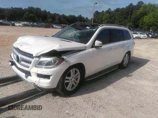 2014 Mercedes-Benz GL 450 z VIN 4JGDF7CE2EA287810, wystawiony jako IAAI lot #39696896 z przebiegiem 181 816 mil mil oraz . Historia ofert i sprzedaży dostępna na DreamBid. Obrazek 2.