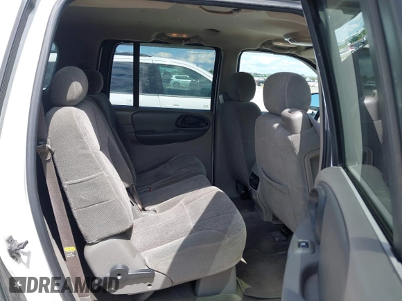 2003 Chevrolet TrailBlazer EXT LT with VIN 1GNES16S536229622, listed as a IAAI auction lot 42212434 with 302,884 mi miles and . Bid and sale history available at DreamBid. Image 8.