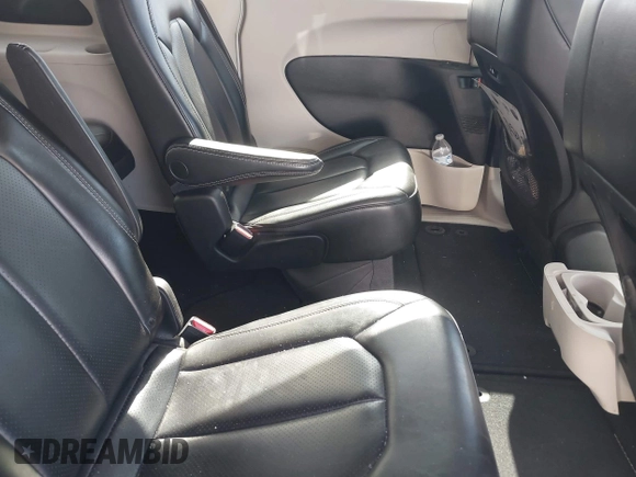 2023 Chrysler Pacifica Touring L with VIN 2C4RC1BG6PR531640, listed as a IAAI auction lot 42251680 with 31,638 mi miles and . Bid and sale history available at DreamBid. Image 8.