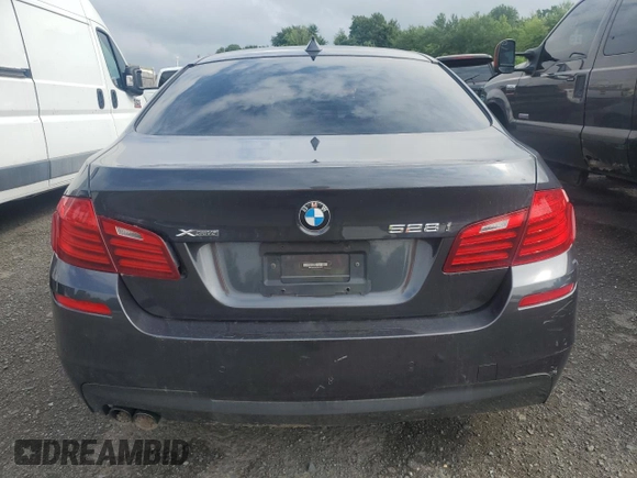2014 BMW 5 Series 528i xDrive with VIN WBA5A7C52ED616475, listed as a Copart auction lot 64597745 with 91,306 mi miles and Salvage title. Bid and sale history available at DreamBid. Image 6.