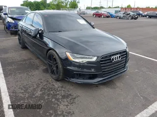 2014 Audi A6 Prestige with VIN WAUHGAFC6EN141698, listed as a IAAI auction lot 42330033 with 174,401 mi miles and . Bid and sale history available at DreamBid. Image 1.