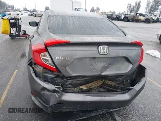 2017 Honda Civic Sedan LX with VIN 19XFC2F68HE212205, listed as a IAAI auction lot 41527843 with 128,401 mi miles. Bid and sale history available at carsss.com. Image 16.