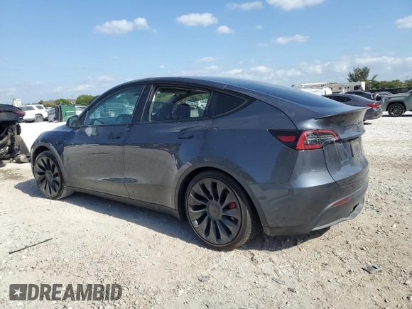 2022 Tesla Model Y Performance with VIN 7SAYGDEF9NF513648, listed as a Copart auction lot 55156475 with 29,280 mi miles and Non Repairable. Bid and sale history available at DreamBid. Image 2.