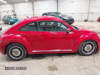 2013 Volkswagen Beetle 2.5L with VIN 3VWJP7AT3DM606135, listed as a IAAI auction lot 42006924 with 78,534 mi miles and . Bid and sale history available at DreamBid. Image 13.