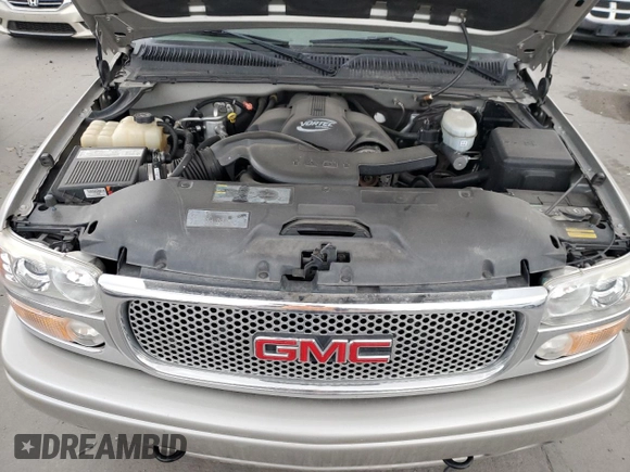 2005 GMC Sierra Denali z VIN 2GTEK63N951254277, wystawiony jako Copart lot #47635015 z przebiegiem 177 167 mil mil oraz Szkody całkowita. Historia ofert i sprzedaży dostępna na DreamBid. Obrazek 11.