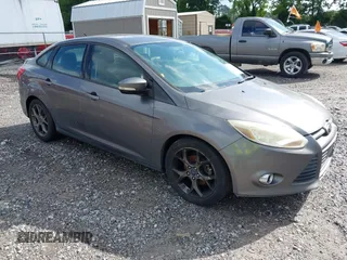 2013 Ford Focus SE z VIN 1FADP3F25DL381720, wystawiony jako IAAI lot #42325188 z przebiegiem 167 597 mil mil oraz . Historia ofert i sprzedaży dostępna na DreamBid. Obrazek 1.