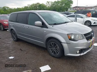 2014 Dodge Grand Caravan SXT with VIN 2C4RDGCG3ER451465, listed as a IAAI auction lot 42111958 with 176,707 mi miles and . Bid and sale history available at DreamBid. Image 1.