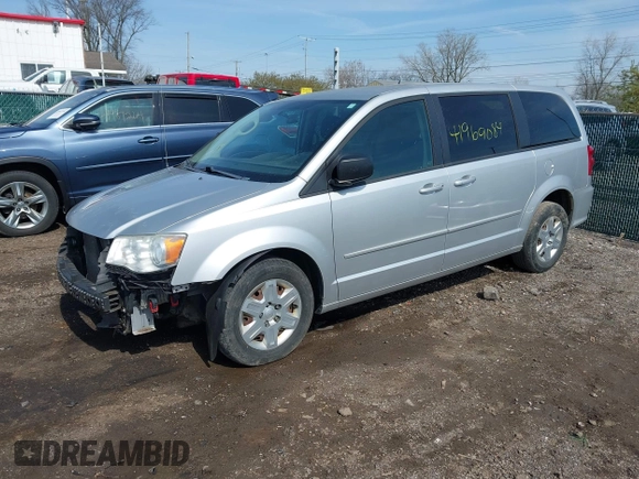2012 Dodge Grand Caravan SE with VIN 2C4RDGBG6CR241232, listed as a IAAI auction lot 41969084 with 83,847 mi miles and . Bid and sale history available at DreamBid. Image 2.