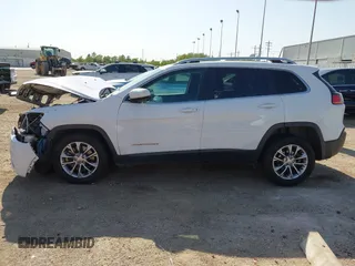 2019 Jeep Cherokee Latitude Plus with VIN 1C4PJLLB4KD455861, listed as a IAAI auction lot 41975695 with 104,413 mi miles. Bid and sale history available at carsss.com. Image 14.