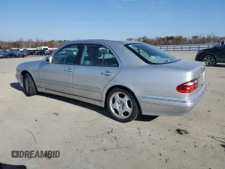 2000 Mercedes-Benz E-Class AWD with VIN WDBJF83J6YX032328, listed as a Copart auction lot 81353974 with 156,729 mi miles and Clean Title. Bid and sale history available at carsss.com. Image 2.