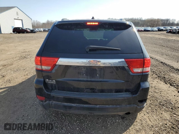 2012 Jeep Grand Cherokee Laredo with VIN 1C4RJFAG5CC280262, listed as a Copart auction lot 48686475 with 130,673 mi miles and Salvage Title. Bid and sale history available at carsss.com. Image 6.