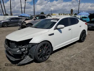 2014 Kia Optima SX with VIN 5XXGR4A79EG319832, listed as a Copart auction lot 71830914 with 153,963 mi miles and Salvage title. Bid and sale history available at DreamBid. Image 1.
