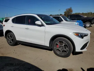 2019 Alfa Romeo Stelvio Ti Lusso z VIN ZASPAKBN2K7C49899, wystawiony jako Copart lot #77323474 z przebiegiem 88 826 mil mil oraz Szkoda całkowita • Salvage title. Historia ofert i sprzedaży dostępna na DreamBid. Obrazek 4.