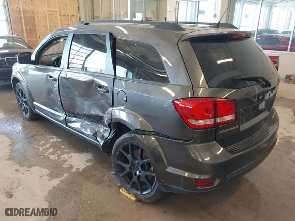 2014 Dodge Journey SXT with VIN 3C4PDCBB6ET151356, listed as a IAAI auction lot 41696752 with 101,728 mi miles. Bid and sale history available at carsss.com. Image 3.