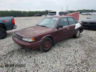 1989 Toyota Camry DLX z VIN 4T1SV21E1KU108151, wystawiony jako Copart lot #73657634 z przebiegiem 347 186 mil mil oraz Nie do naprawy • Non repairable. Historia ofert i sprzedaży dostępna na DreamBid. Obrazek 1.