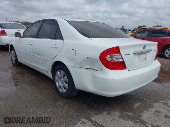 2004 Toyota Camry LE with VIN 4T1BE32K84U340887, listed as a IAAI auction lot 42143000 with Not Provided miles and . Bid and sale history available at DreamBid. Image 3.