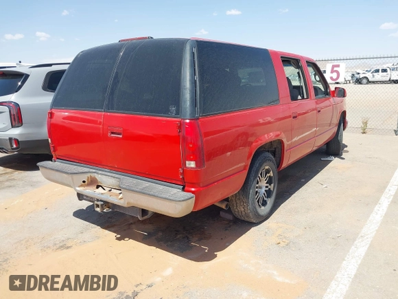 1998 GMC Suburban with VIN 3GKEC16R0WG507627, listed as a IAAI auction lot 42473984 with 200,064 mi miles and . Bid and sale history available at DreamBid. Image 4.