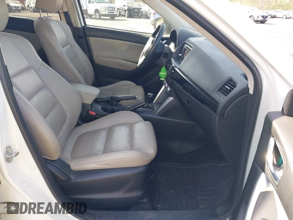 2013 Mazda CX-5 Grand Touring with VIN JM3KE4DE3D0156957, listed as a IAAI auction lot 42085443 with 146,990 mi miles. Bid and sale history available at carsss.com. Image 5.