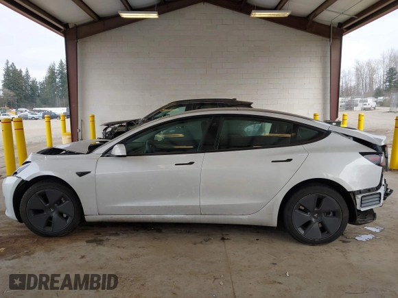 2023 Tesla Model 3 z VIN 5YJ3E1EA8PF412166, wystawiony jako IAAI lot #41461983 z przebiegiem 25 908 mil mil oraz . Historia ofert i sprzedaży dostępna na DreamBid. Obrazek 14.