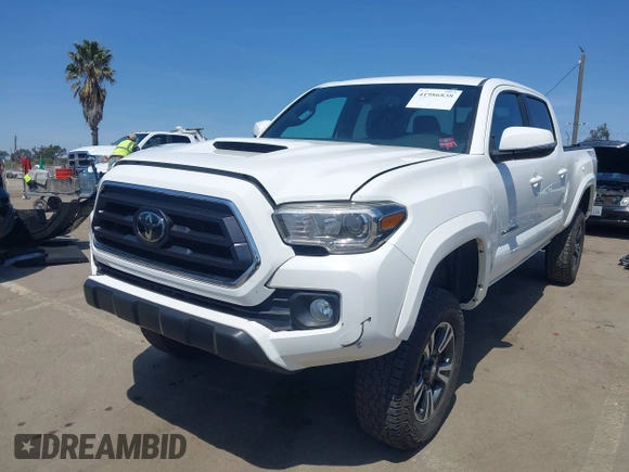 2021 Toyota Tacoma 4WD SR5 with VIN 3TMDZ5BN4MM106693, listed as a IAAI auction lot 41986838 with 52,510 mi miles. Bid and sale history available at carsss.com. Image 21.