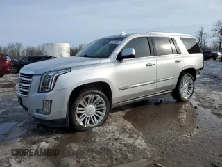 2015 Cadillac Escalade Platinum z VIN 1GYS4PKJ1FR722054, wystawiony jako Copart lot #48218065 z przebiegiem 193 041 mil mil oraz Szkoda całkowita • Salvage title. Historia ofert i sprzedaży dostępna na DreamBid. Obrazek 1.