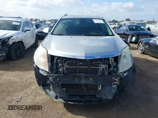 2014 Cadillac SRX Performance Collection with VIN 3GYFNCE39ES544135, listed as a IAAI auction lot 41808644 with 145,772 mi miles and . Bid and sale history available at carsss.com. Image 6.