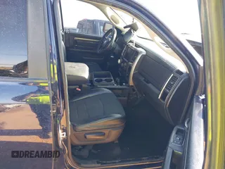 2014 Ram 1500 Sport z VIN 1C6RR6MT3ES366719, wystawiony jako IAAI lot #42228139 z przebiegiem Nie podano mil oraz . Historia ofert i sprzedaży dostępna na DreamBid. Obrazek 5.