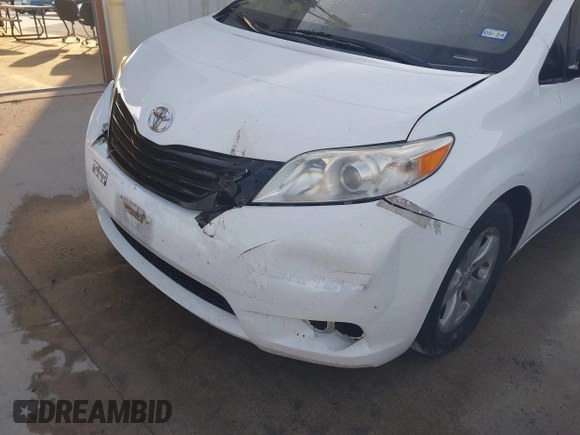 2015 Toyota Sienna L with VIN 5TDZK3DC5FS657115, listed as a IAAI auction lot 42109678 with 176,995 mi miles. Bid and sale history available at carsss.com. Image 6.