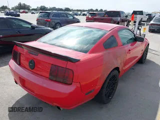 2006 Ford Mustang GT Deluxe with VIN 1ZVFT82H465211066, listed as a IAAI auction lot 41572368 with 84,389 mi miles. Bid and sale history available at carsss.com. Image 4.