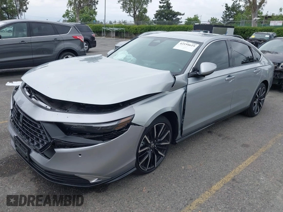 2024 Honda Accord Touring z VIN 1HGCY2F87RA082705, wystawiony jako IAAI lot #42194619 z przebiegiem 7 896 mil mil oraz . Historia ofert i sprzedaży dostępna na DreamBid. Obrazek 2.