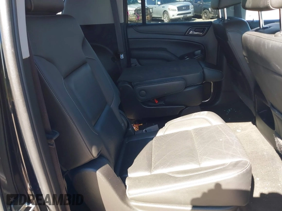 2017 Chevrolet Suburban Premier with VIN 1GNSKJKC8HR285321, listed as a IAAI auction lot 41796659 with 128,113 mi miles and . Bid and sale history available at DreamBid. Image 8.