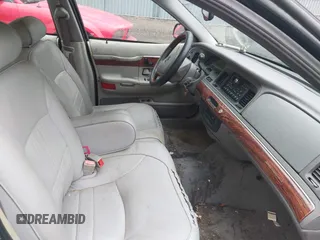 2002 Mercury Grand Marquis LS Premium z VIN 2MEFM75W42X644236, wystawiony jako IAAI lot #42276863 z przebiegiem 56 460 mil mil oraz . Historia ofert i sprzedaży dostępna na DreamBid. Obrazek 5.
