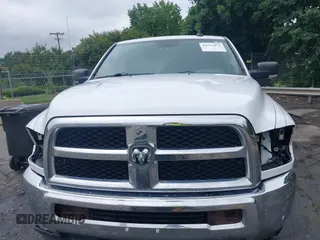 2013 Ram 2500 SLT z VIN 3C6TR5DT7DG524758, wystawiony jako IAAI lot #42333873 z przebiegiem Nie podano mil oraz . Historia ofert i sprzedaży dostępna na DreamBid. Obrazek 13.