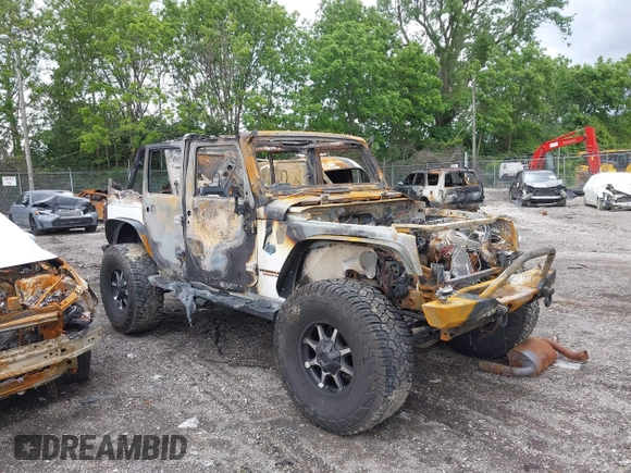 2012 Jeep Wrangler Unlimited Sahara with VIN 1C4BJWEG0CL167797, listed as a IAAI auction lot 42331710 with Not provided miles and . Bid and sale history available at DreamBid. Image 1.