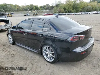 2016 Mitsubishi Lancer ES with VIN JA32U2FU4GU009420, listed as a Copart auction lot 74225654 with 120,657 mi miles and Salvage Title. Bid and sale history available at DreamBid. Image 2.