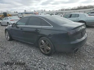 2013 Audi A6 3.0T Prestige with VIN WAUHGAFC9DN107009, listed as a Copart auction lot 87405474 with 124,171 mi miles and Salvage Title. Bid and sale history available at carsss.com. Image 2.