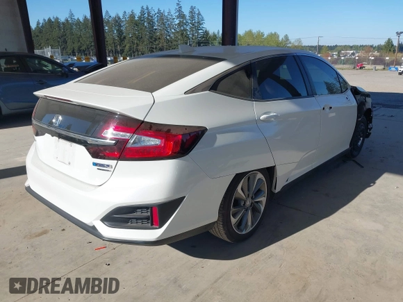2018 Honda Clarity Plug-In Hybrid Touring with VIN JHMZC5F38JC003207, listed as a IAAI auction lot 42057987 with 35,420 mi miles. Bid and sale history available at carsss.com. Image 4.
