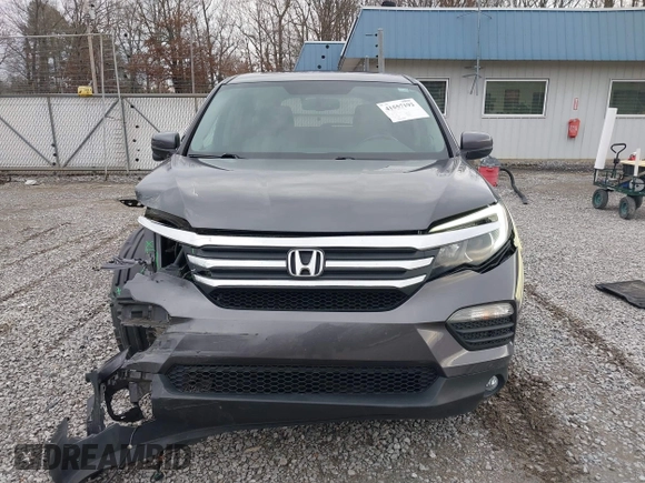 2017 Honda Pilot EX-L with VIN 5FNYF6H59HB029160, listed as a IAAI auction lot 41557192 with 157,153 mi miles and . Bid and sale history available at DreamBid. Image 13.
