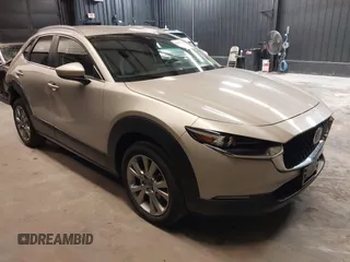 2023 Mazda CX-30 S Carbon Edition with VIN 3MVDMBCM9PM549377, listed as a IAAI auction lot 42663054 with 13,120 mi miles and . Bid and sale history available at DreamBid. Image 1.