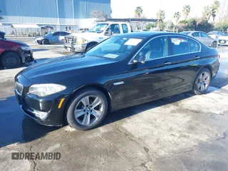 2011 BMW 5 Series 528i with VIN WBAFR1C54BC736807, listed as a IAAI auction lot 41511519 with 212,110 mi miles and . Bid and sale history available at carsss.com. Image 2.