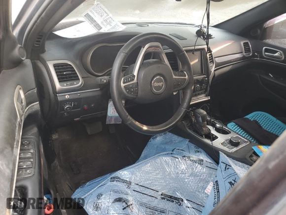 2017 Jeep Grand Cherokee Trailhawk with VIN 1C4RJFLTXHC700177, listed as a Copart auction lot 60660645 with Not provided miles and Salvage title. Bid and sale history available at DreamBid. Image 8.