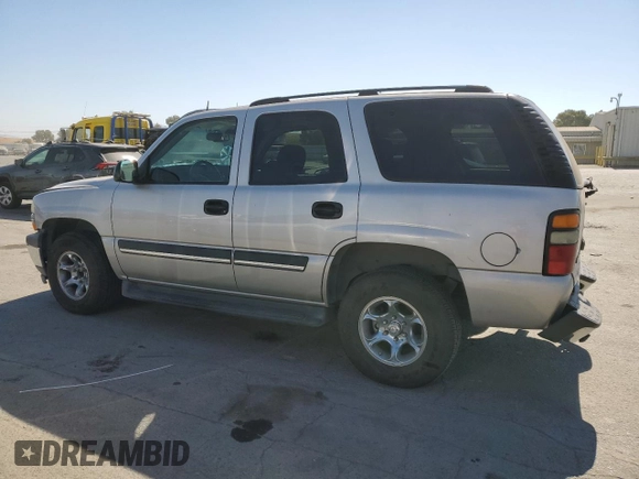 2005 Chevrolet Tahoe LT with VIN 1GNEC13T35R103206, listed as a Copart auction lot 74310784 with 128,780 mi miles and Salvage Title. Bid and sale history available at carsss.com. Image 2.