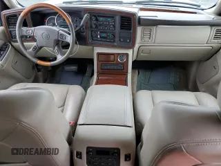 2003 Cadillac Escalade z VIN 1GYEC63T93R208877, wystawiony jako Copart lot #83894424 z przebiegiem 160 530 mil mil oraz Szkoda całkowita • Salvage title. Historia ofert i sprzedaży dostępna na DreamBid. Obrazek 8.