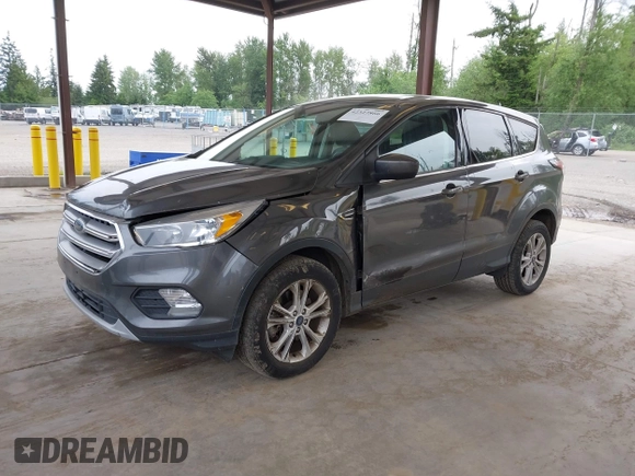 2017 Ford Escape SE z VIN 1FMCU9G93HUC97081, wystawiony jako IAAI lot #42327866 z przebiegiem 97 580 mil mil oraz . Historia ofert i sprzedaży dostępna na DreamBid. Obrazek 17.