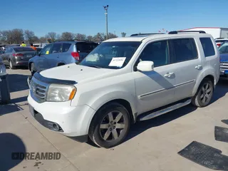 2012 Honda Pilot Touring with VIN 5FNYF3H91CB020673, listed as a IAAI auction lot 41721836 with 123,607 mi miles and . Bid and sale history available at carsss.com. Image 2.