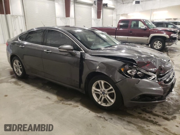 2018 Ford Fusion SE z VIN 3FA6P0HD6JR260522, wystawiony jako Copart lot #54382215 z przebiegiem 151 611 mil mil oraz Szkoda całkowita • Salvage title. Historia ofert i sprzedaży dostępna na DreamBid. Obrazek 4.