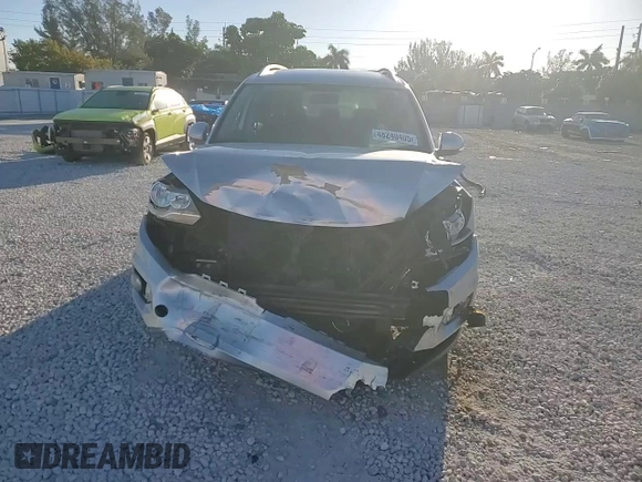 2014 Volkswagen Tiguan SE z VIN WVGAV3AX6EW549608, wystawiony jako Copart lot #48240405 z przebiegiem 81 629 mil mil oraz Szkoda całkowita • Salvage title. Historia ofert i sprzedaży dostępna na DreamBid. Obrazek 14.